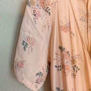 Floral, blush pink wrap dress.